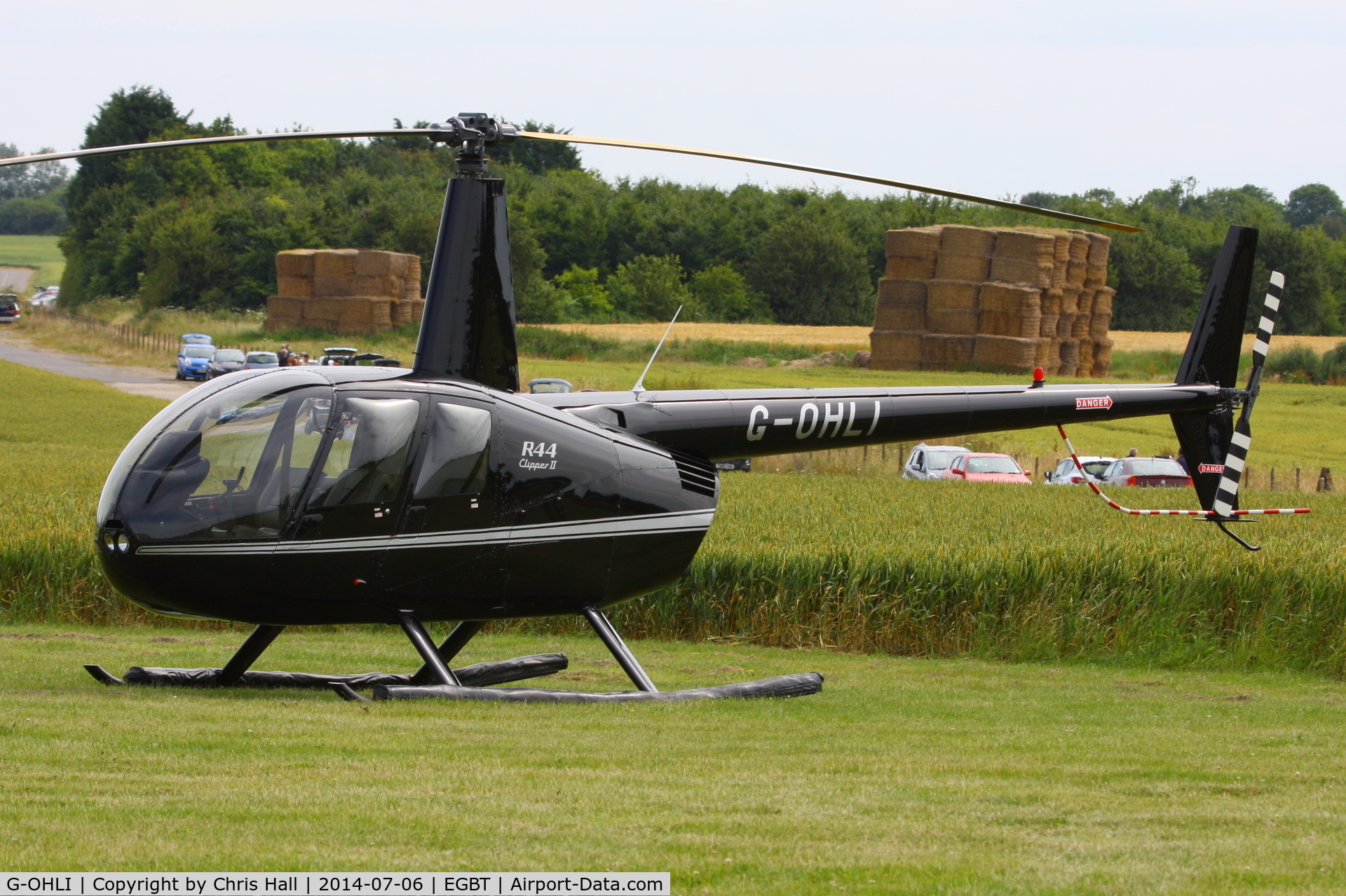 G-OHLI, 2005 Robinson R44 Clipper II C/N 10832, ferrying race fans to the British F1 Grand Prix at Silverstone