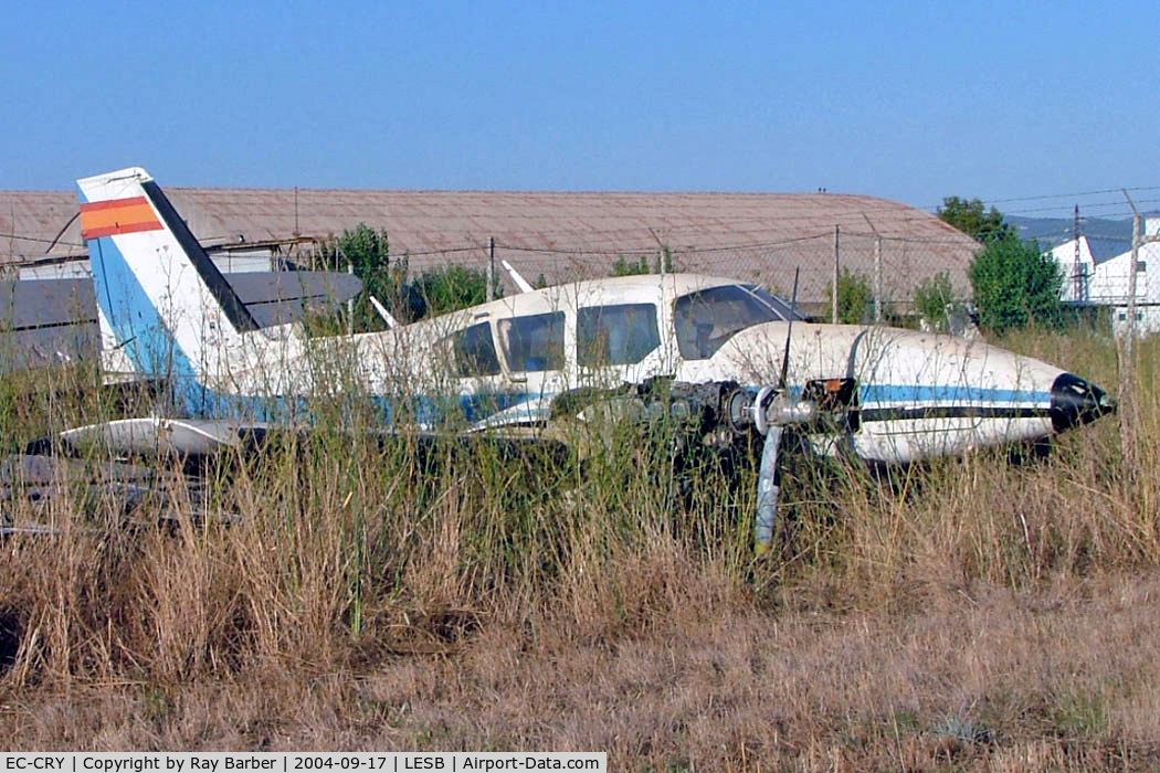 EC-CRY, Piper PA-23-250 C/N 277554041, Piper PA-23-250 Aztec E [27-7554041] Palma-Son Bonet~EC 17/09/2004 Seen here derelict since moved to the fire dump and burnt out.