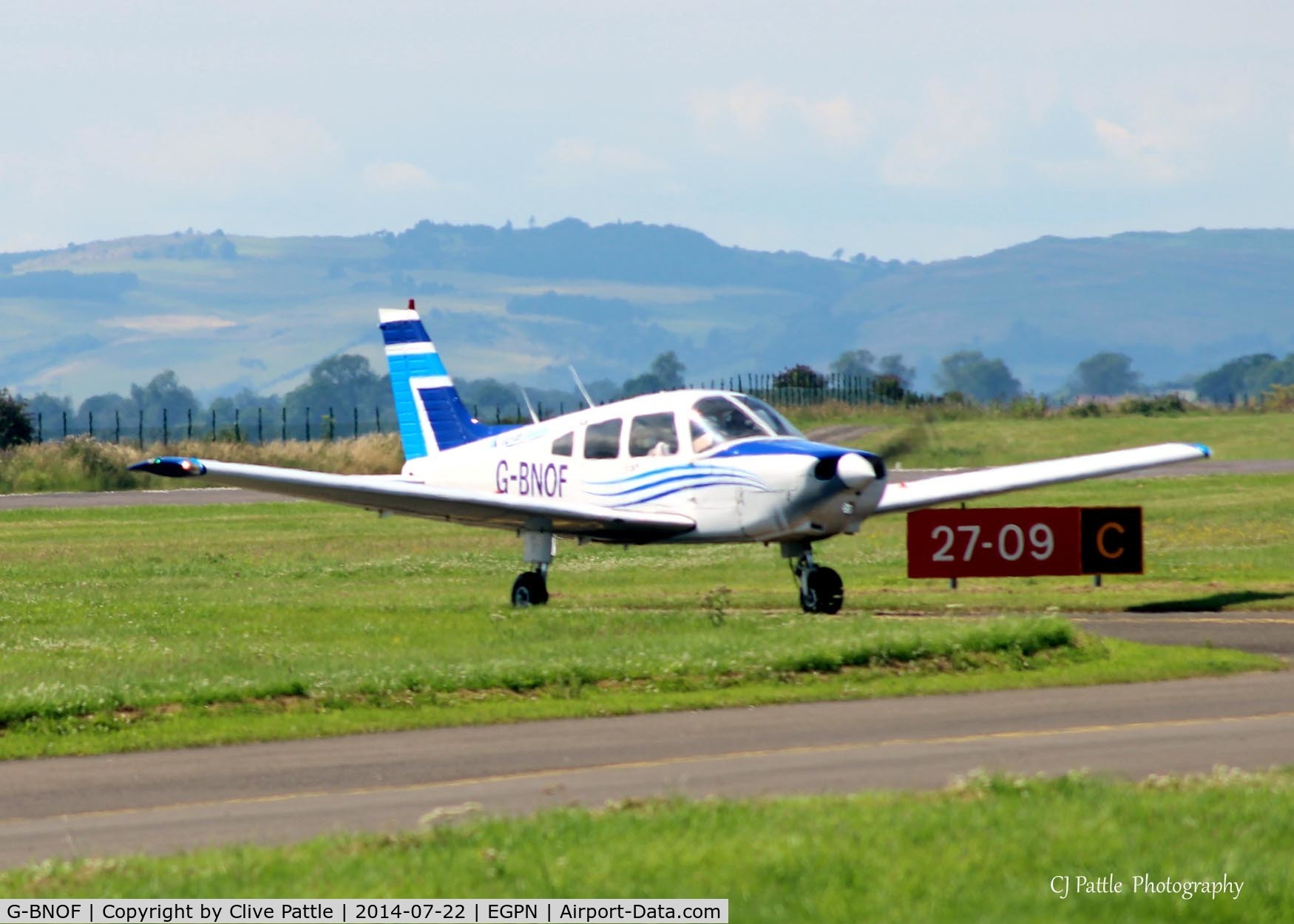 G-BNOF, 1987 Piper PA-28-161 Cherokee Warrior II C/N 2816014, Tayside Aviation aircraft taxies in from another training sortie at Dundee Riverside EGPN