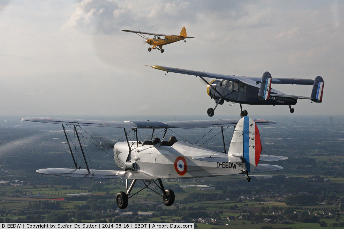 D-EEDW, Stampe-Vertongen SV-4C C/N 245, Returning home from Schaffen Oldtimer Fly-in in close formation with G-CCKW (Piper PA-18-150 Super Cub), F-BNEX (Max Holste MH-1521 Broussard) and D-EEDW (Stampe-Vertongen SV-4C). Picture taken from G-NETY (Piper PA-18-150 Super Cub).