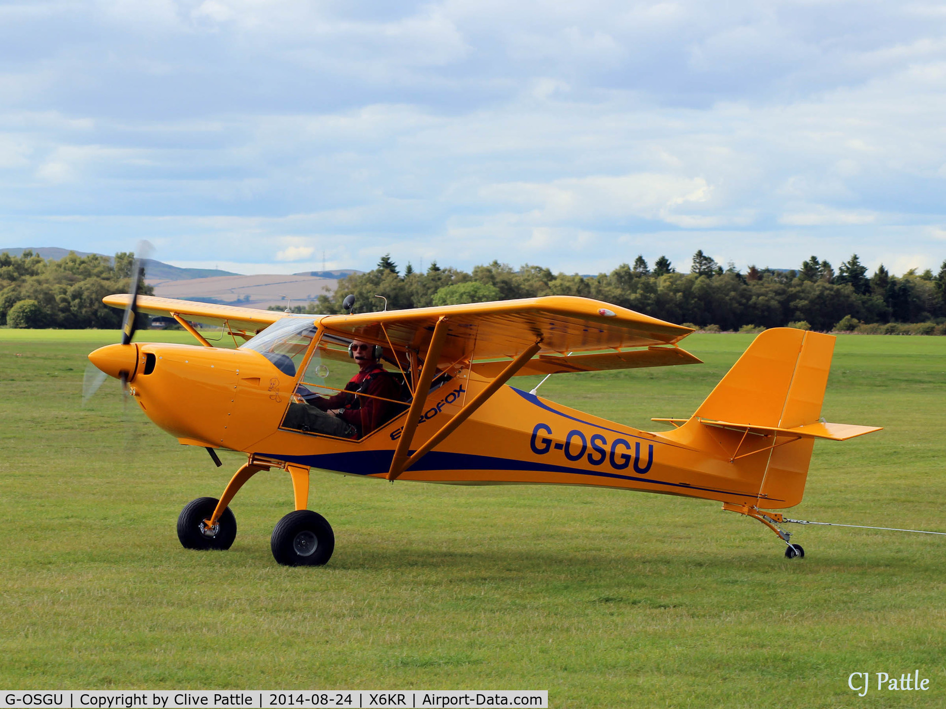 G-OSGU, 2014 Aeropro Eurofox 912(S) C/N LAA 376-15214, Used for aero-tow at Portmoak Gliding Field, Kinross, Scotland is homebuilt G-OSGU, first registered May 2014 the pilot pauses for a pose.