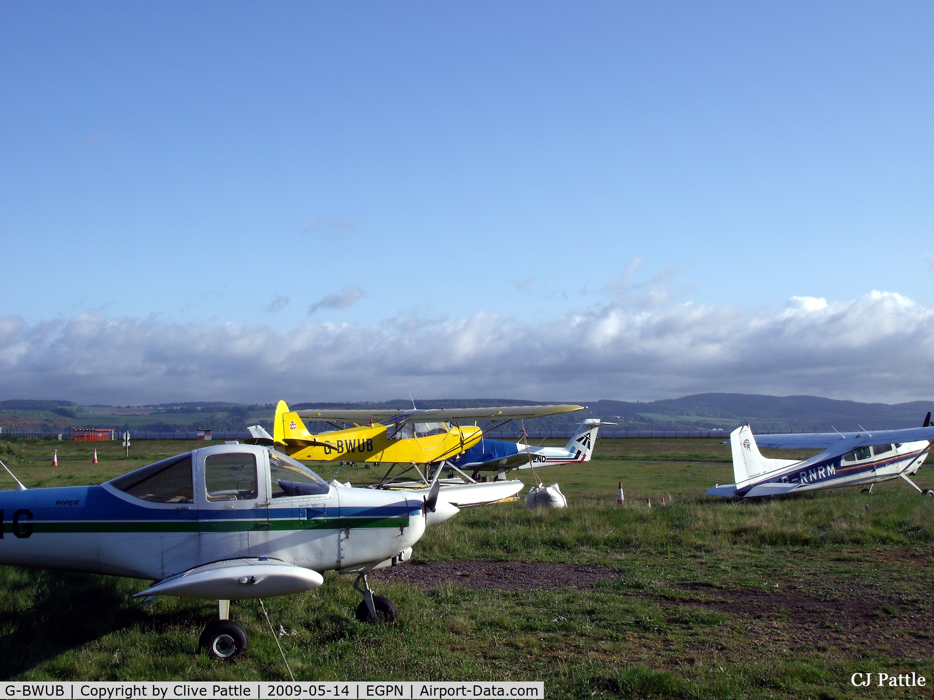 G-BWUB, 1954 Piper L-21B Super Cub C/N 18-3986, G-BWUB in amongst a varied assortment out to grass at Dundee Riverside EGPN, May 2009