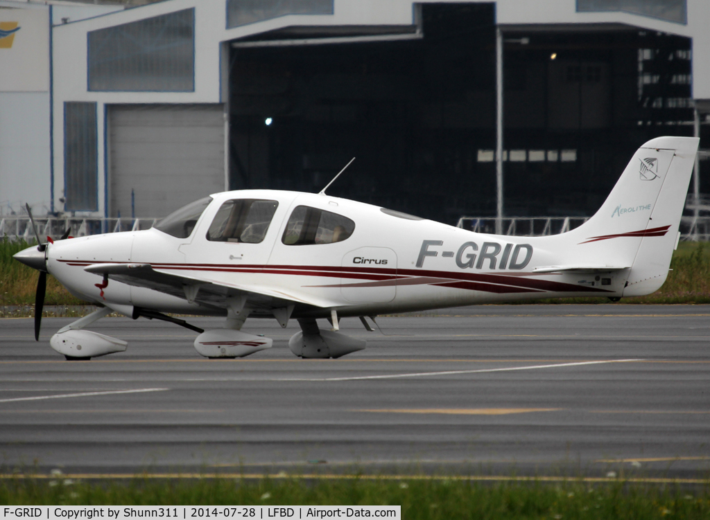 F-GRID, 2005 Cirrus SR20 C/N 1347, Parked at the General Aviation area...