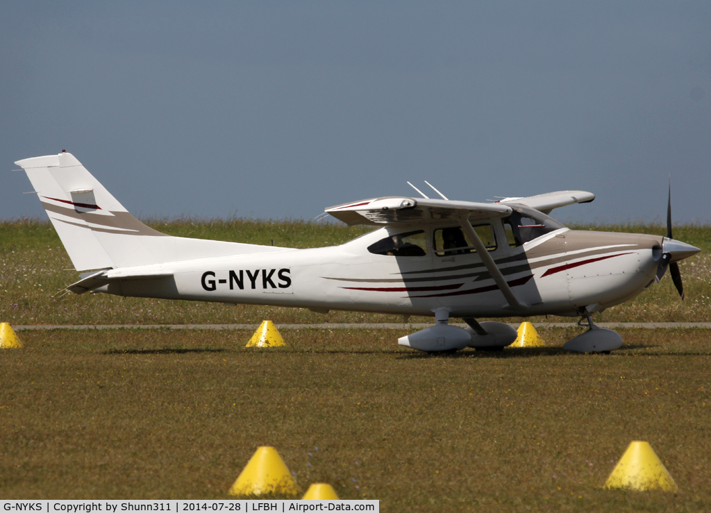 G-NYKS, 2005 Cessna 182T Skylane Skylane C/N 182-81607, Parked in the grass...