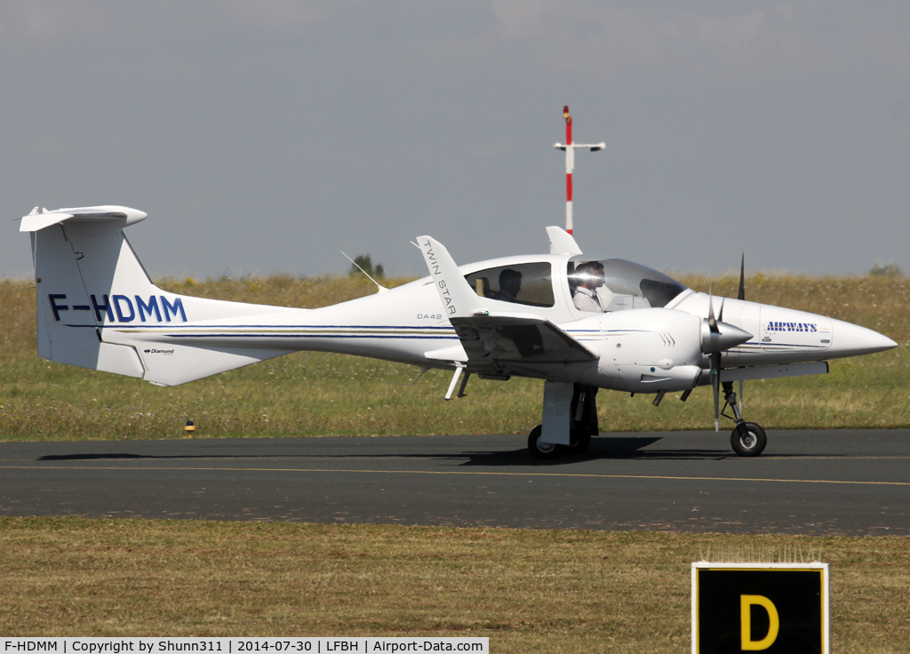 F-HDMM, 2006 Diamond DA-42 Twin Star C/N 42-175, Taxiing to the General Aviation area...