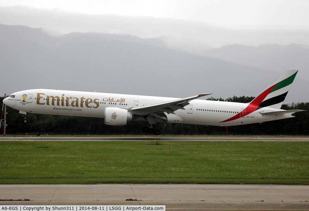 A6-EGS, 2012 Boeing 777-31H/ER C/N 41078, Landing rwy 23 with additional Wolrd Cup 2014 logo on cockpit...