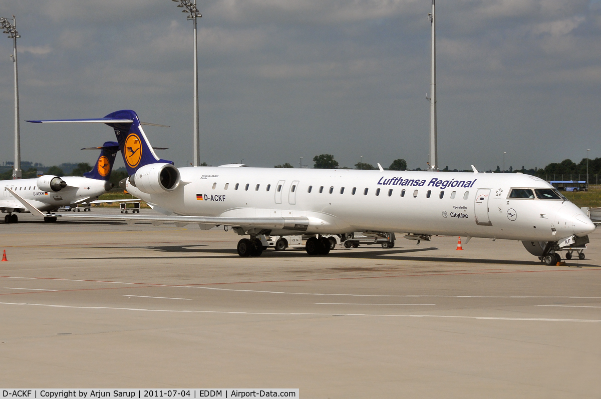 D-ACKF, 2006 Bombardier CRJ-900LR (CL-600-2D24) C/N 15083, 'Prenzlau' on the tarmac at MUC in front of 'Radebeul'.