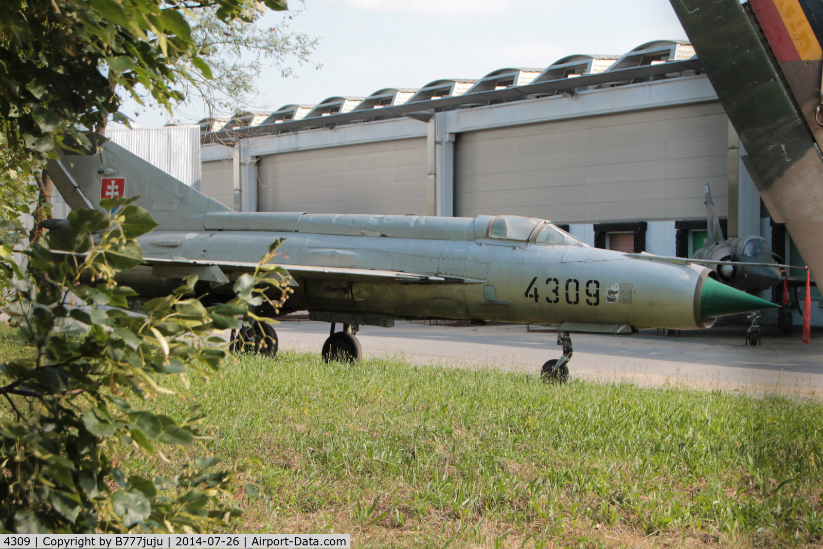 4309, Mikoyan-Gurevich MiG-21MF C/N 964309, store at Croissy-Beaubourg