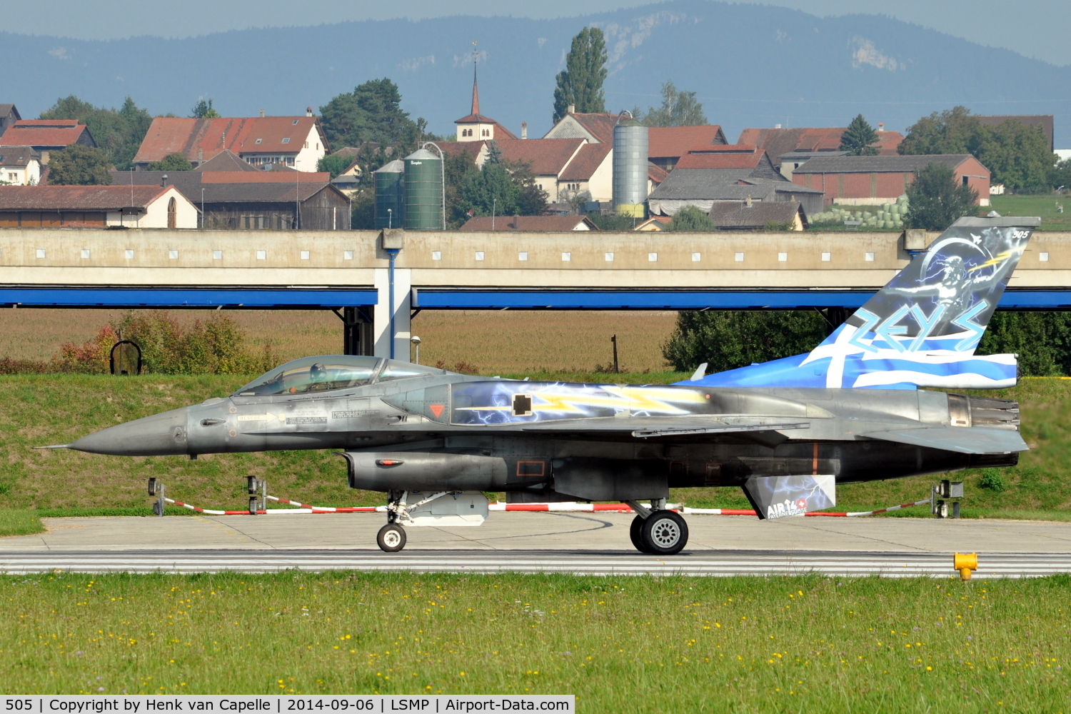505, General Dynamics F-16C Fighting Falcon C/N XK-6, F-16C-52 with conformal fuel tanks of the Air Force of Greece on the runway of Payerne Air Base, Switzerland, for a display (AIR14). Note that ZEUS is painted on its tail.
