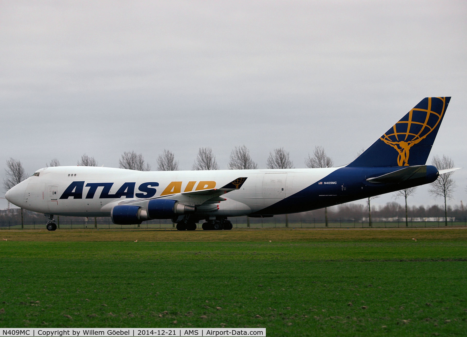 N409MC, 2000 Boeing 747-47UF C/N 30558/1242, Taxi from runway 18R to the gate of Schiphol Airport