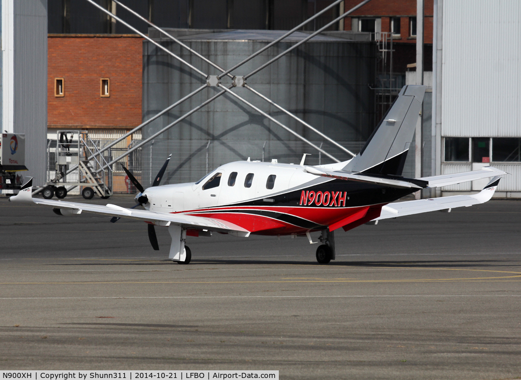 N900XH, 2014 Socata TBM-900 C/N 1019, Parked at the General Aviation area...