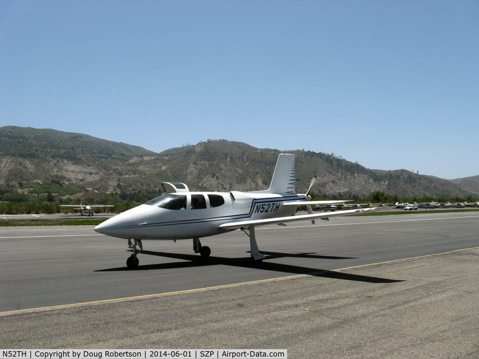 N52TH, 1999 Cirrus VK-30 C/N 143, 1999 Hastings Cirrus Design VK-30, Continental IO-550 300 Hp, tri-blade pusher prop, trailing link main gear, retractable tri-gear, Experimental class, see aloft in DVD 'One Six Right'. Taxi back after landing Rwy 22