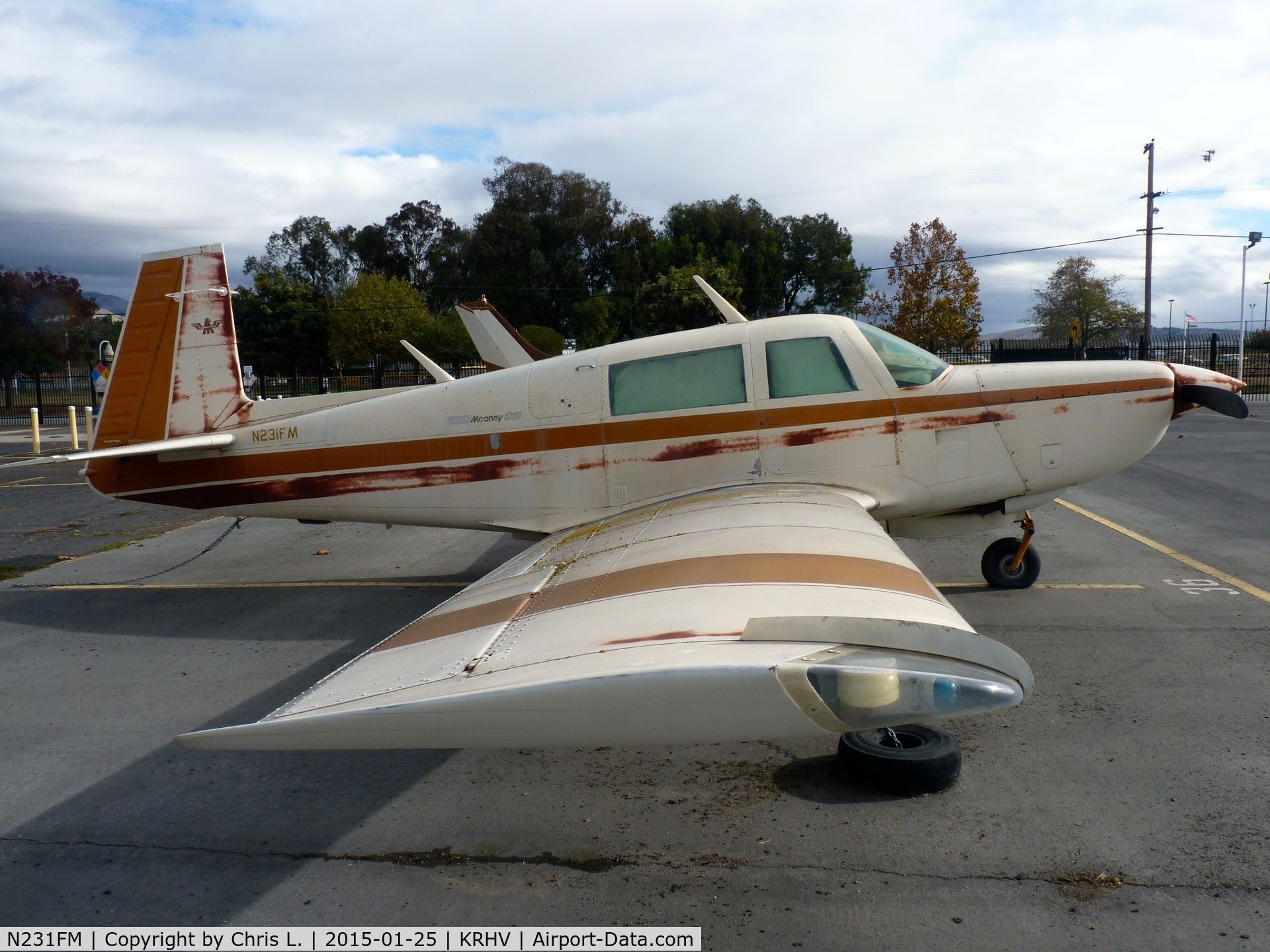 N231FM, 1979 Mooney M20K C/N 25-0223, A local and rusty Mooney M20P sitting near Trade Winds taken at Reid Hillview, CA.