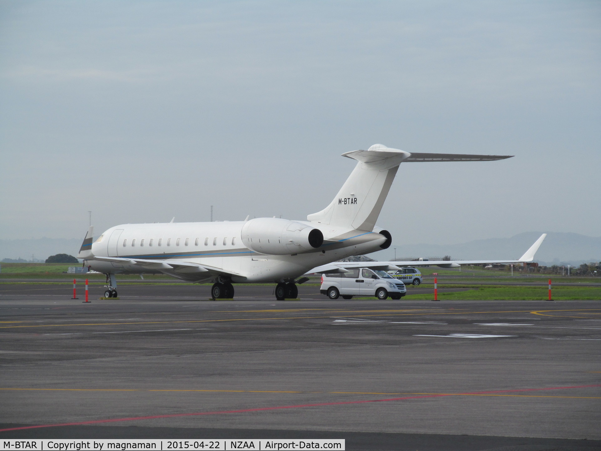 M-BTAR, 2007 Bombardier BD-700-1A10 Global Express C/N 9250, view from domestic car park across apron