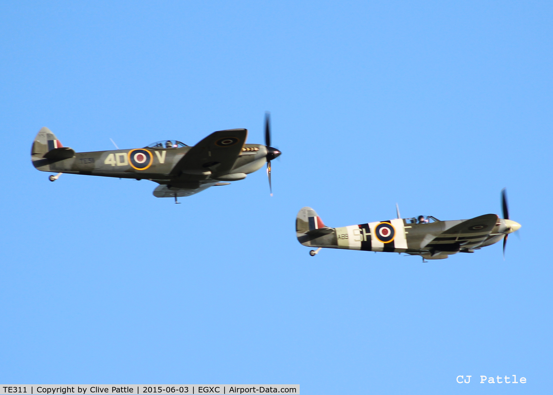 TE311, 1945 Supermarine 361 Spitfire LF.XVIe C/N CBAF.IX.4497, Seen in an evening formation takeoff from its home base at RAF Coningsby EGXC is TE311 (on left) and AB910 both of the RAF BBMF