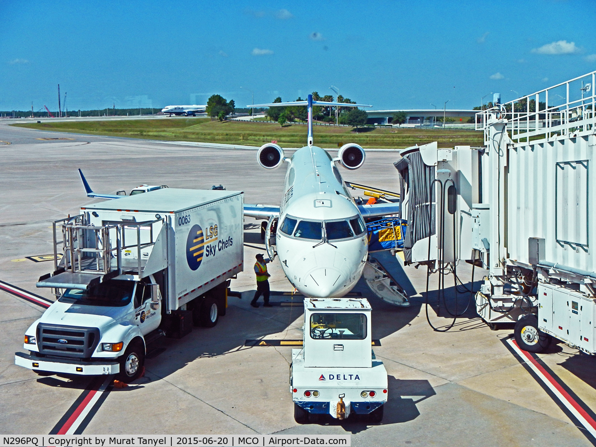 N296PQ, 2013 Bombardier CRJ-900 (CL-600-2D24) C/N 15296, At gate at Orlando International