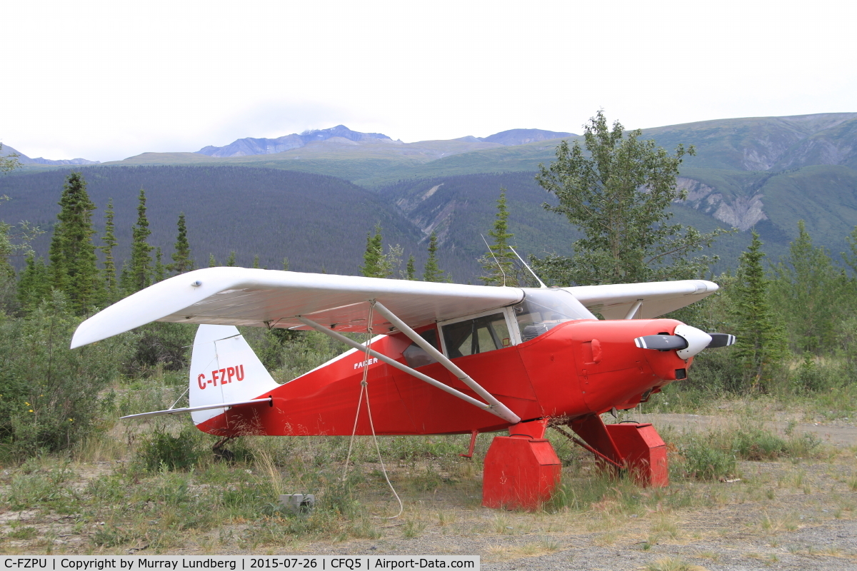 C-FZPU, 1956 Piper PA-22-150 C/N 22-3817, Tied down at Silver City, Yukon.