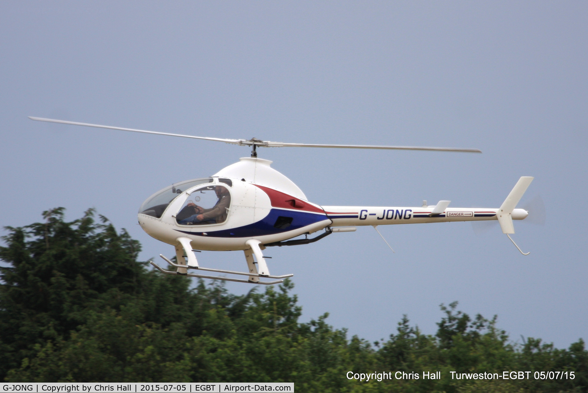 G-JONG, 2004 Rotorway Exec 162F C/N 6168, ferrying race fans to the British F1 Grand Prix at Silverstone