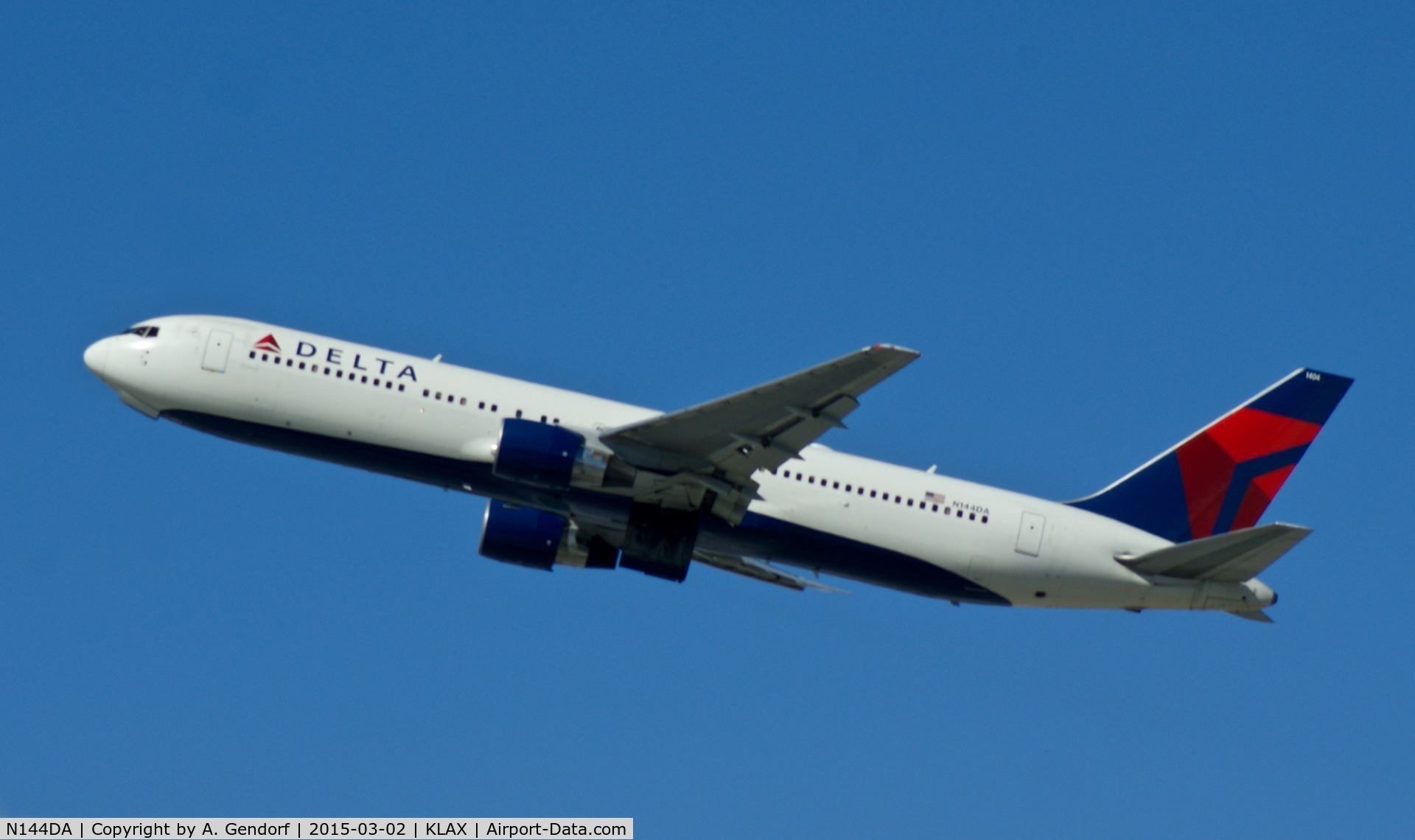 N144DA, 1999 Boeing 767-332 C/N 27584, Delta, is here climbing out at Los Angeles(KLAX)
