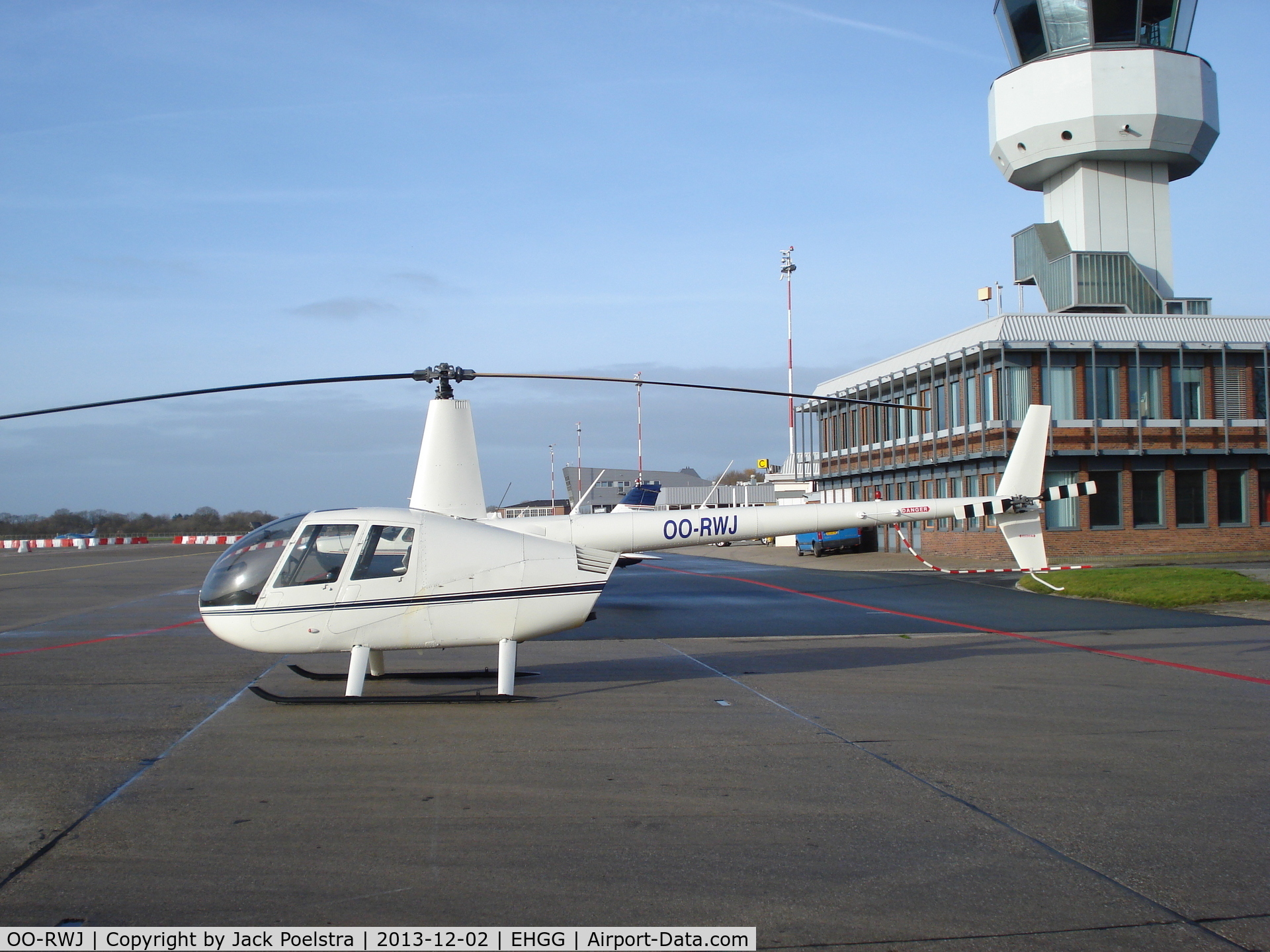 OO-RWJ, Robinson R44 Raven II C/N 11146, On ramp of Groningen airport