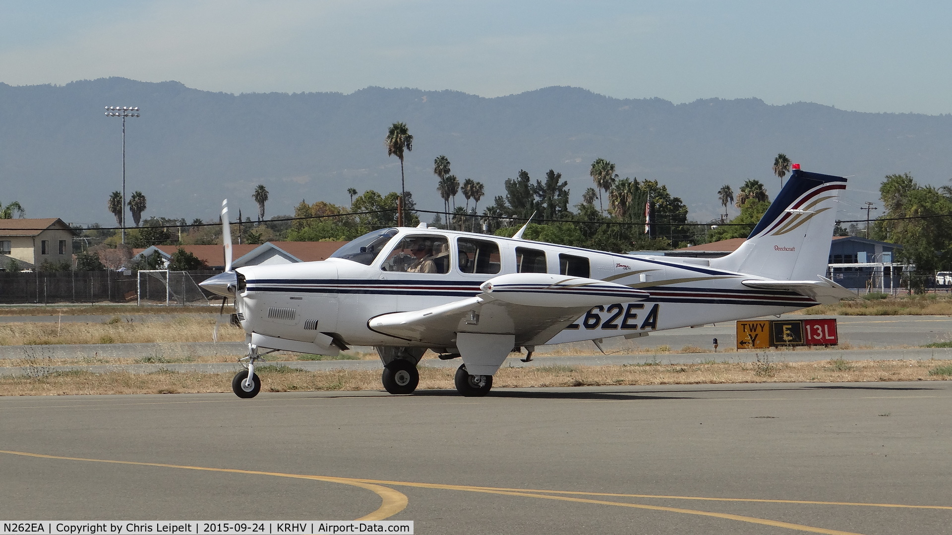 N262EA, 2001 Raytheon Aircraft Company A36 Bonanza C/N E-3417, Dragonbow LLC (Wilmington, SE) 2001 Beechcraft A36 Bonanza taxing to transient parking at Reid Hillview Airport, San Jose, CA.
