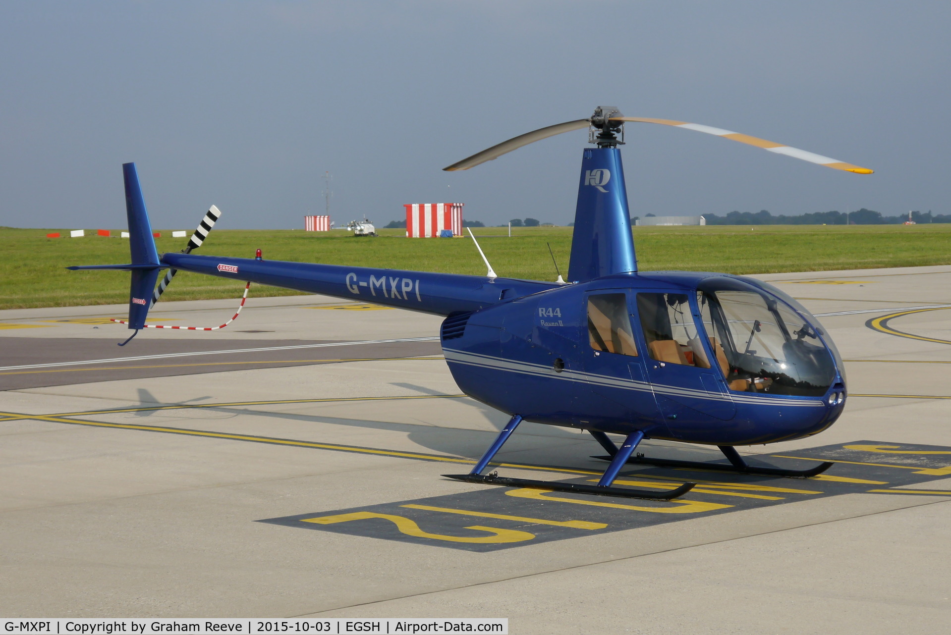 G-MXPI, 2009 Robinson R44 Raven II C/N 12827, Parked at Norwich.