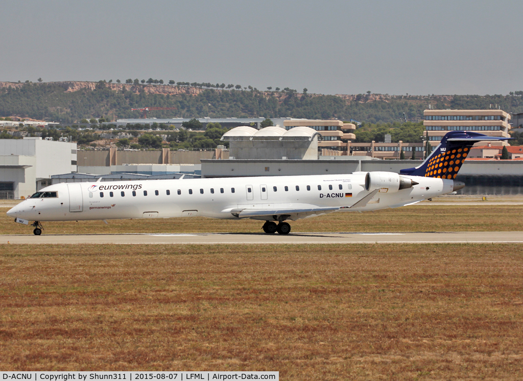 D-ACNU, 2011 Bombardier CRJ-900 NG (CL-600-2D24) C/N 15265, Taking off from rwy 31L
