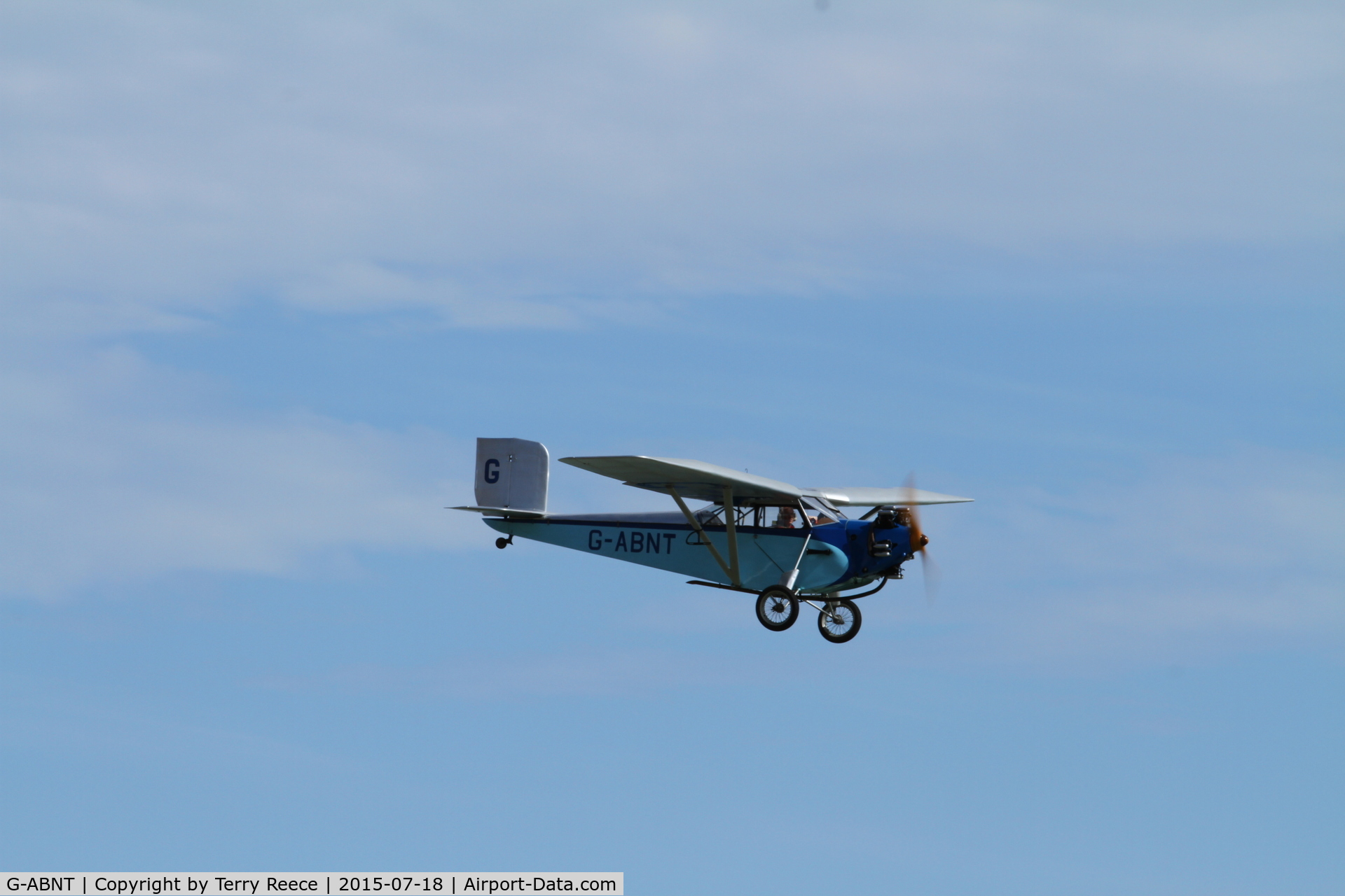 G-ABNT, 1931 Civilian Coupe 02 C/N 03, Coupe in flight over Bexhill on Sea, East Sussex 18/07/15