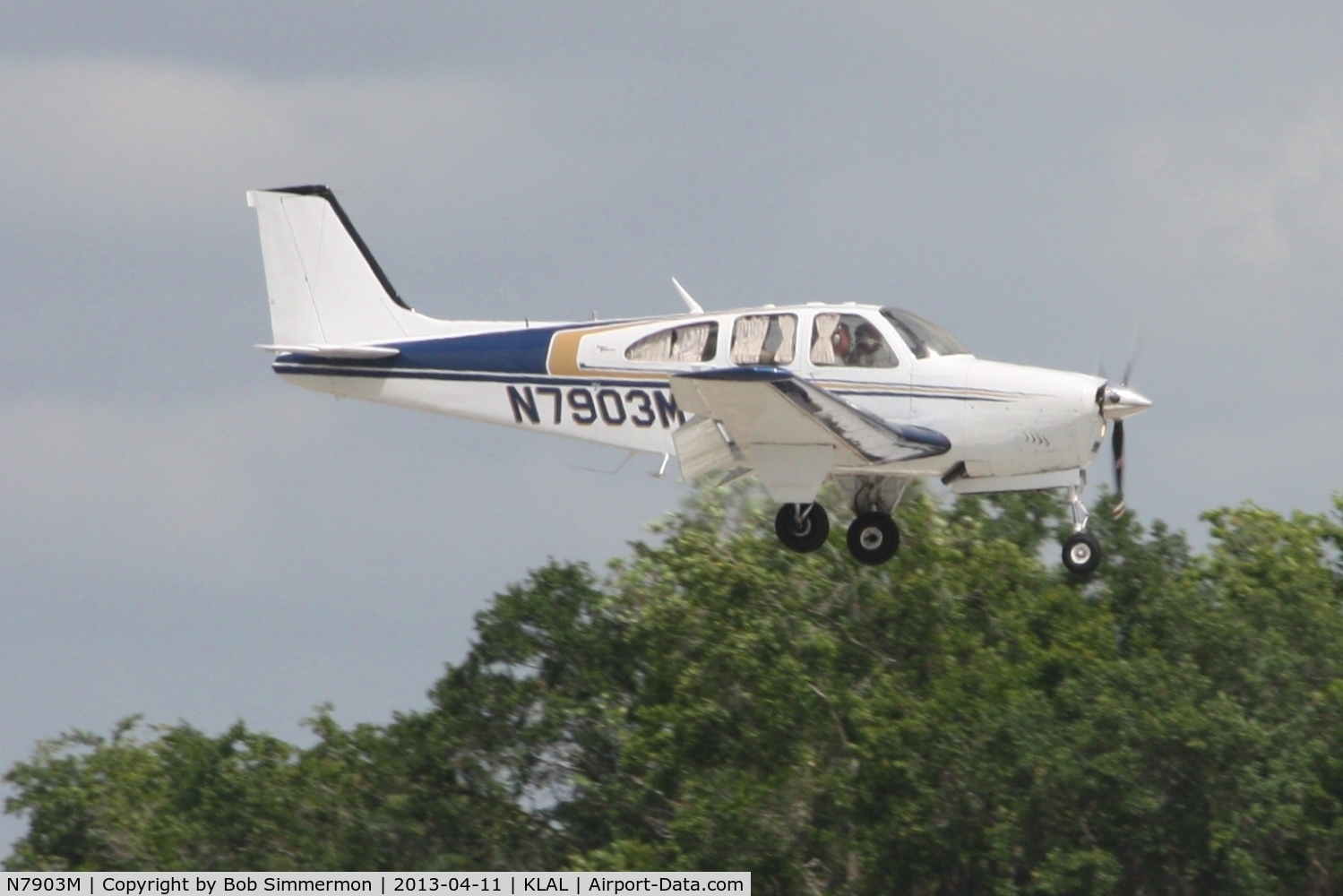 N7903M, 1966 Beech 35-C33A Debonair C/N CE-72, Arriving at Lakeland, FL - Sun N Fun 2013