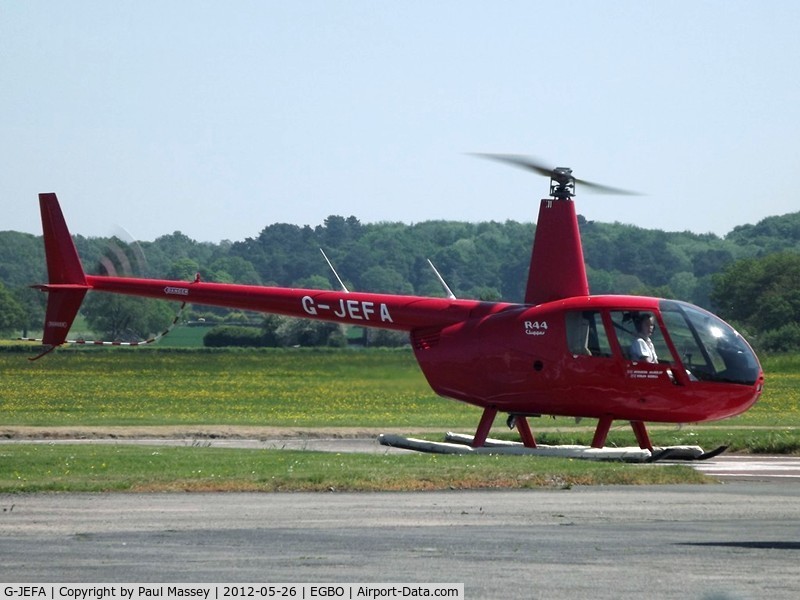 G-JEFA, 2000 Robinson R44 Clipper C/N 0710, @ EGBO for refueling.