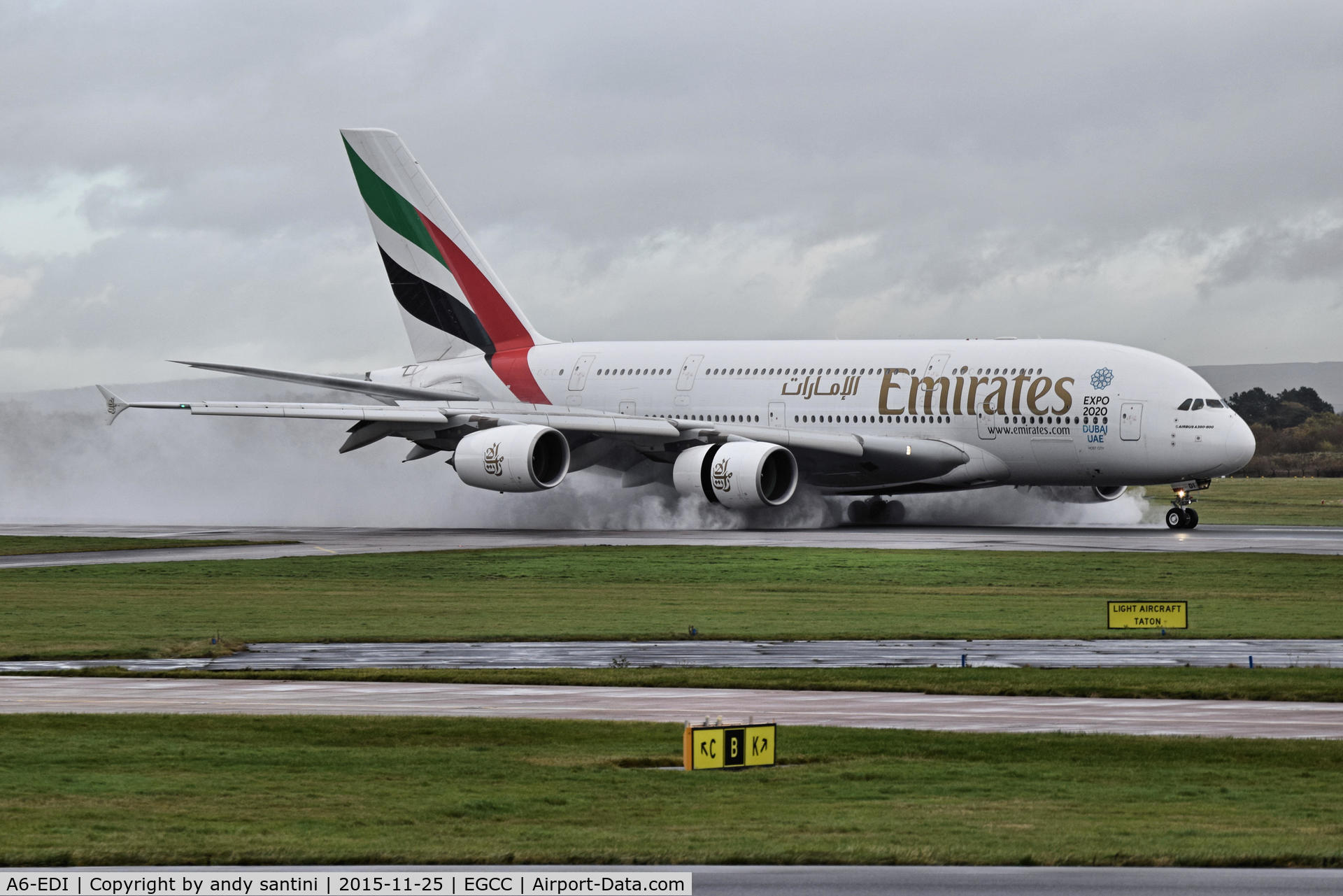 A6-EDI, 2009 Airbus A380-861 C/N 028, just landed on 23R very wet runway