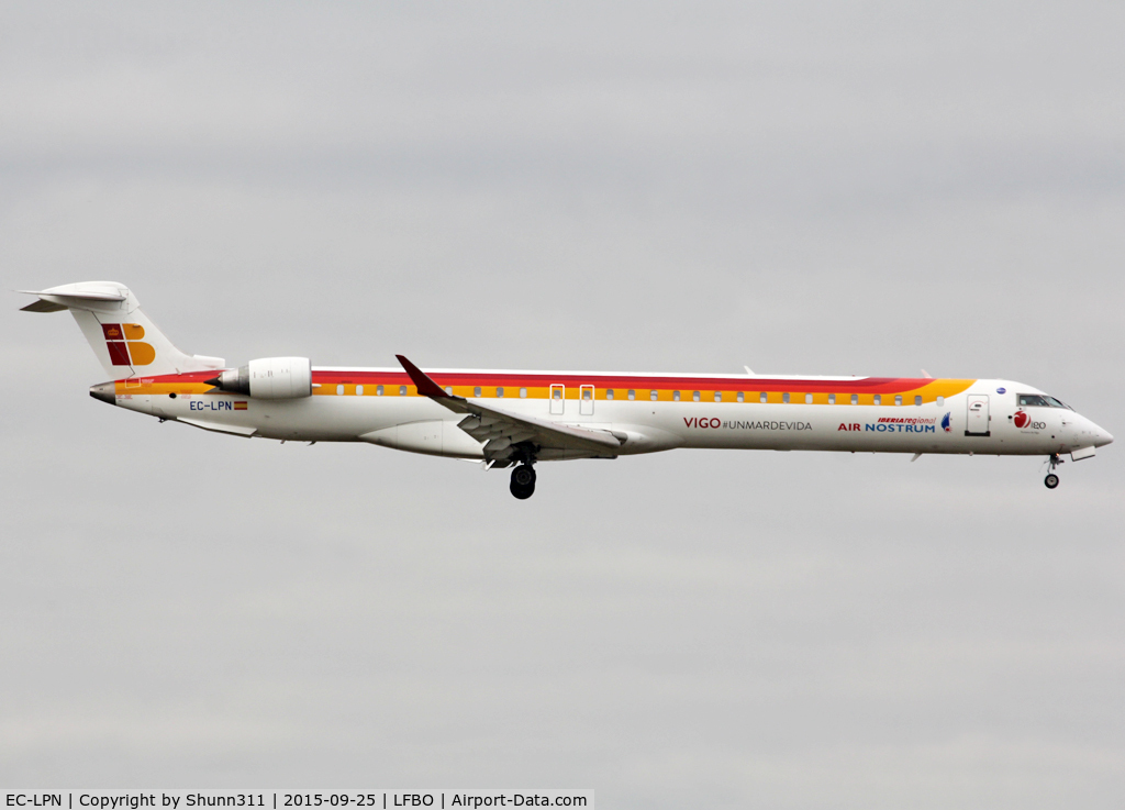 EC-LPN, 2012 Bombardier CRJ-1000ER NG (CL-600-2E25) C/N 19022, Landing rwy 32L... Additional 'Vigo' titles