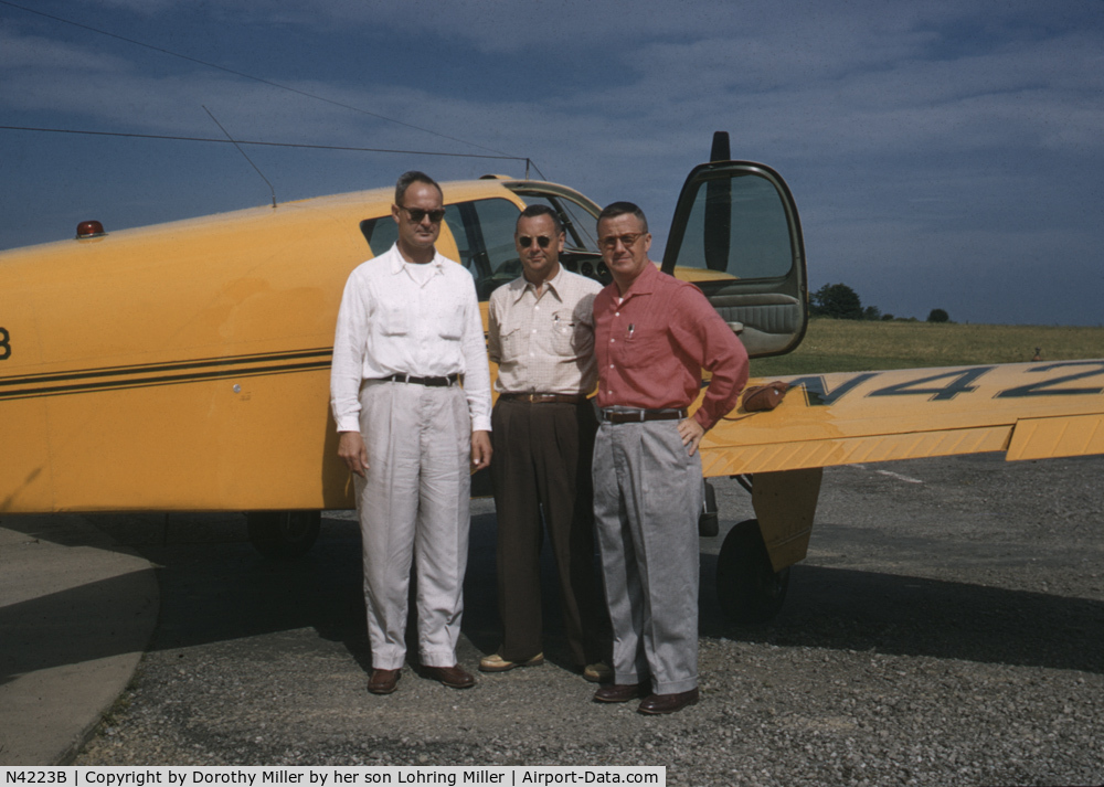 N4223B, 1955 Beech F35 Bonanza C/N D-4190, The airplane in 1956 at the Meadville, Pa airport.  The picture has Franklin Miller standing between George and Bill Dearment, owners of Channellock Tools.