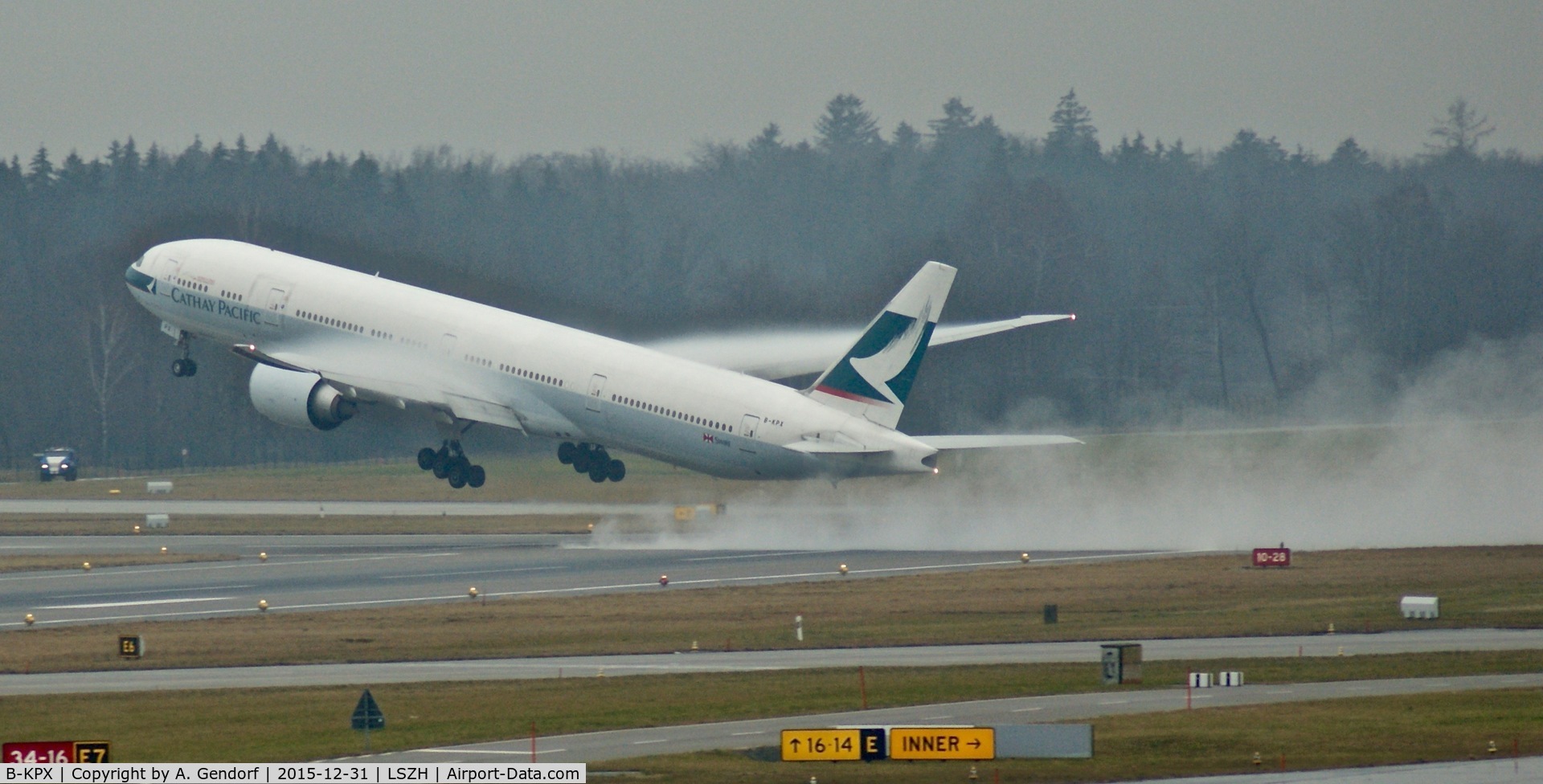 B-KPX, 2011 Boeing 777-367/ER C/N 37897, Cathay Pacific, makes here a very wet departure on RWY28 at Zürich-Kloten(LSZH), bound for Hong Kong(VHHH)