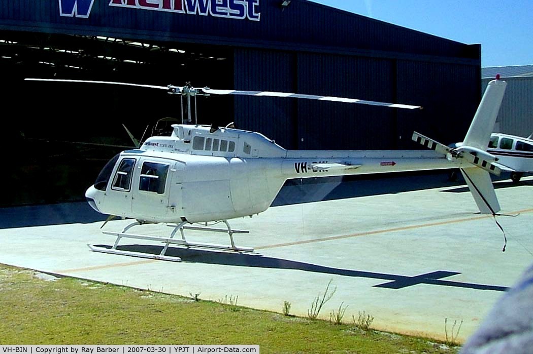 VH-BIN, 1976 Bell 206B JetRanger II C/N 2019, Bell 206B-2 Jet Ranger II [2019] (Heliwest) Perth-Jandakot~VH 30/03/2007. Taken through the glass of the coach.