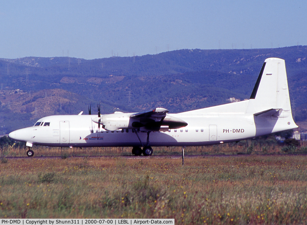 PH-DMD, 1989 Fokker 50 C/N 20144, Waiting holding point rwy 20 for departure... All white with small Air Nostrum titles...