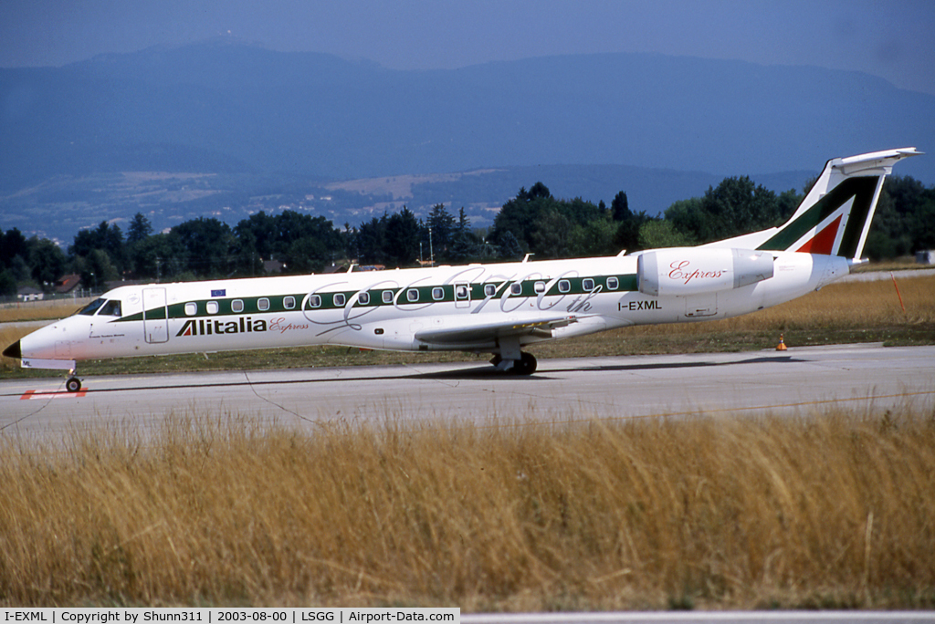 I-EXML, 2003 Embraer ERJ-145LR (EMB-145LR) C/N 145709, Waiting before departure with special '700th Embraer' titles