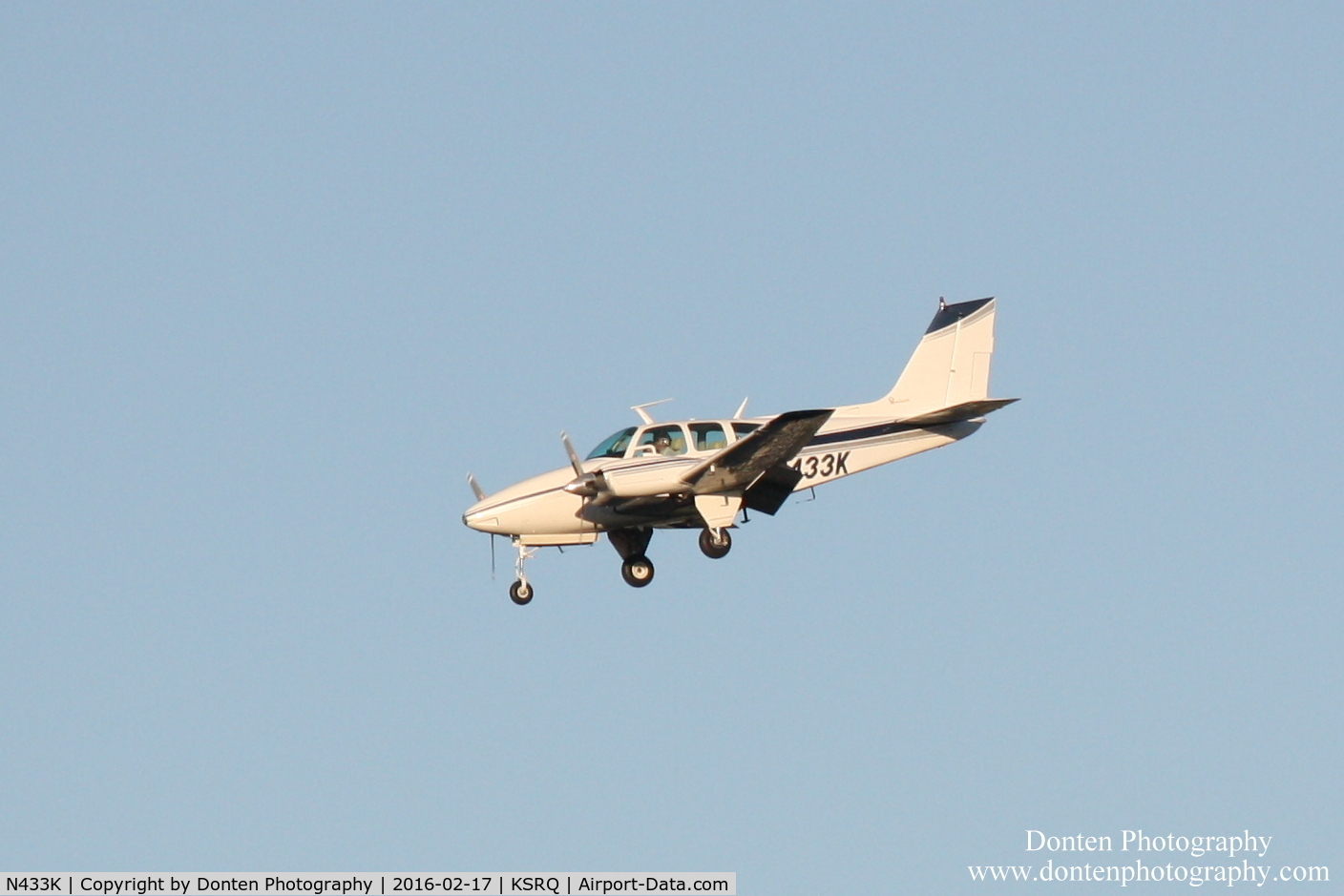 N433K, 1968 Beech D55 Baron C/N TE-564, Beechcraft Baron (N433K) arrives at Sarasota-Bradenton International Airport following flight from Siler City Municipal Airport