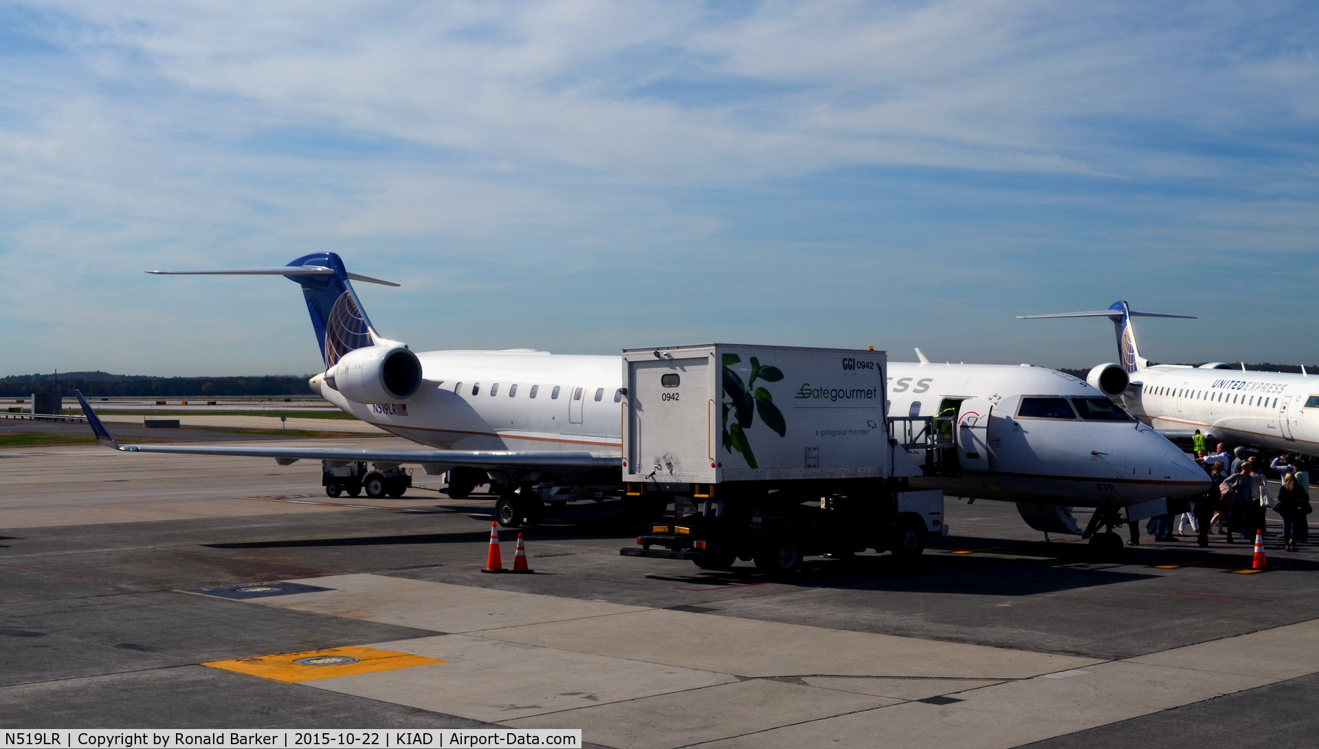 N519LR, 2006 Bombardier CRJ-700 (CL-600-2C10) Regional Jet C/N 10260, At the gate Dulles