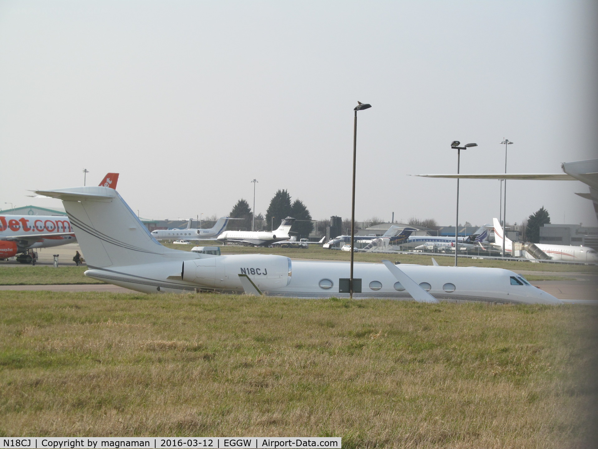 N18CJ, 2008 Gulfstream Aerospace GIV-X (G450) C/N 4141, Hiding behind bank at Luton