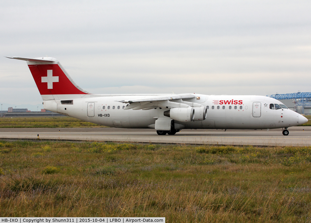 HB-IXO, 1996 British Aerospace Avro 146-RJ100 C/N E3284, Taxiing holding point rwy 14L for departure...