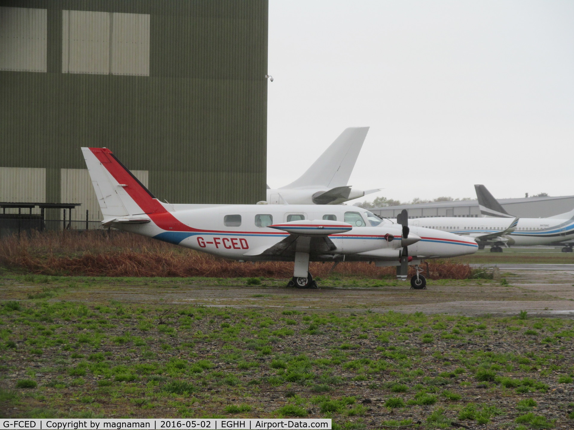 G-FCED, 1981 Piper PA-31T2-620 Cheyenne IIXL C/N 31T-8166013, nice Cheyenne at hurn - hiding behind old AIM hangar