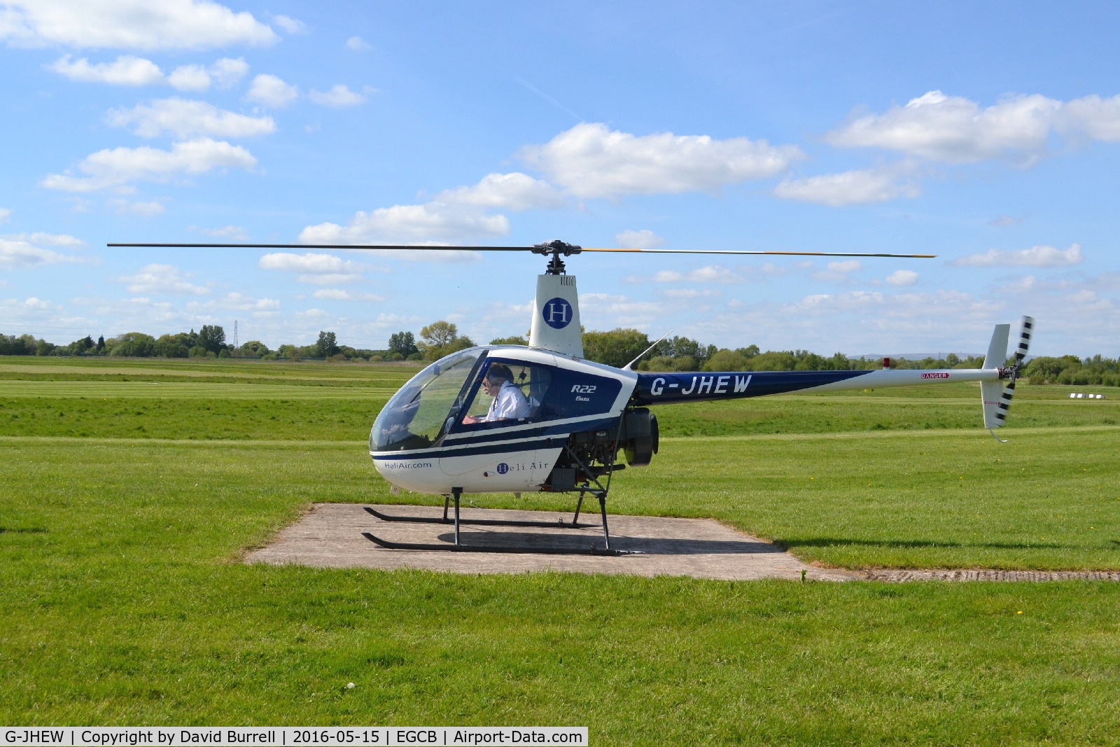 G-JHEW, 1987 Robinson R22 Beta C/N 0672, Robinson R22 Beta at Manchester City Airport.