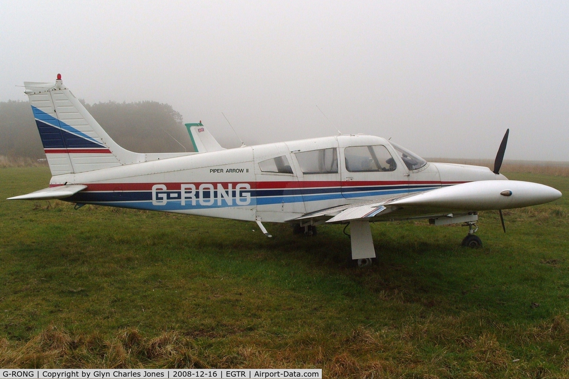G-RONG, 1973 Piper PA-28R-200 Cherokee Arrow II C/N 28R-7335148, Taken on a quiet cold and foggy day. With thanks to Elstree control tower who granted me authority to take photographs on the aerodrome. Previously N16451.