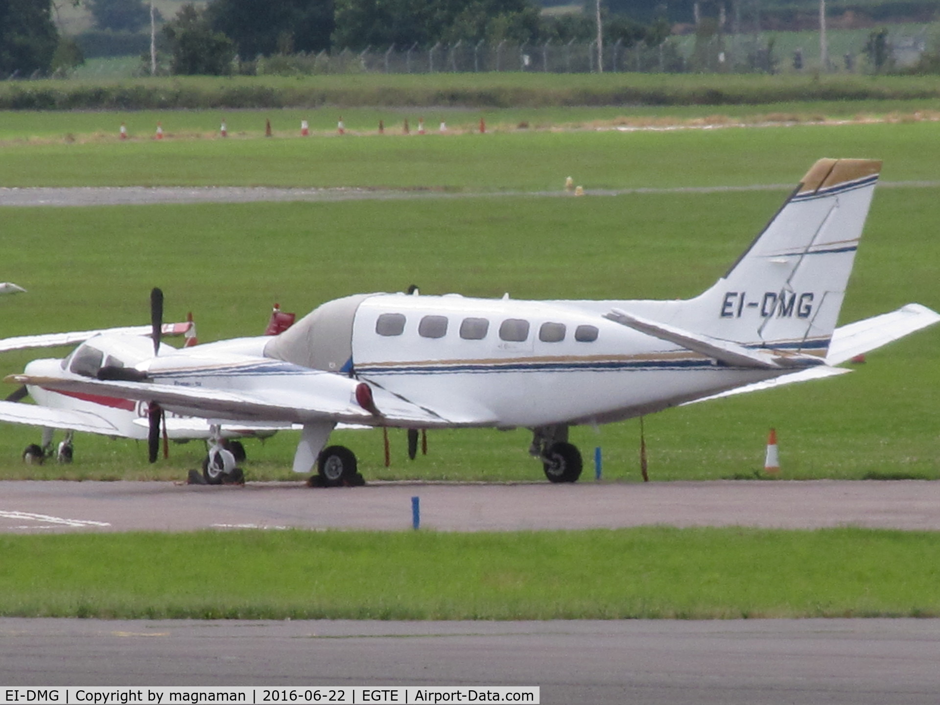 EI-DMG, 1980 Cessna 441 Conquest II C/N 441-0165, across apron at Exeter