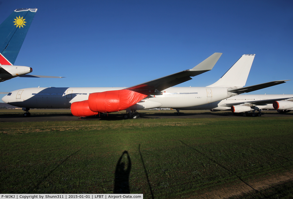 F-WJKJ, 2003 Airbus A340-541 C/N 478, C/n 0478 - Still stored in all white c/s without titles... ex. 9V-SGC