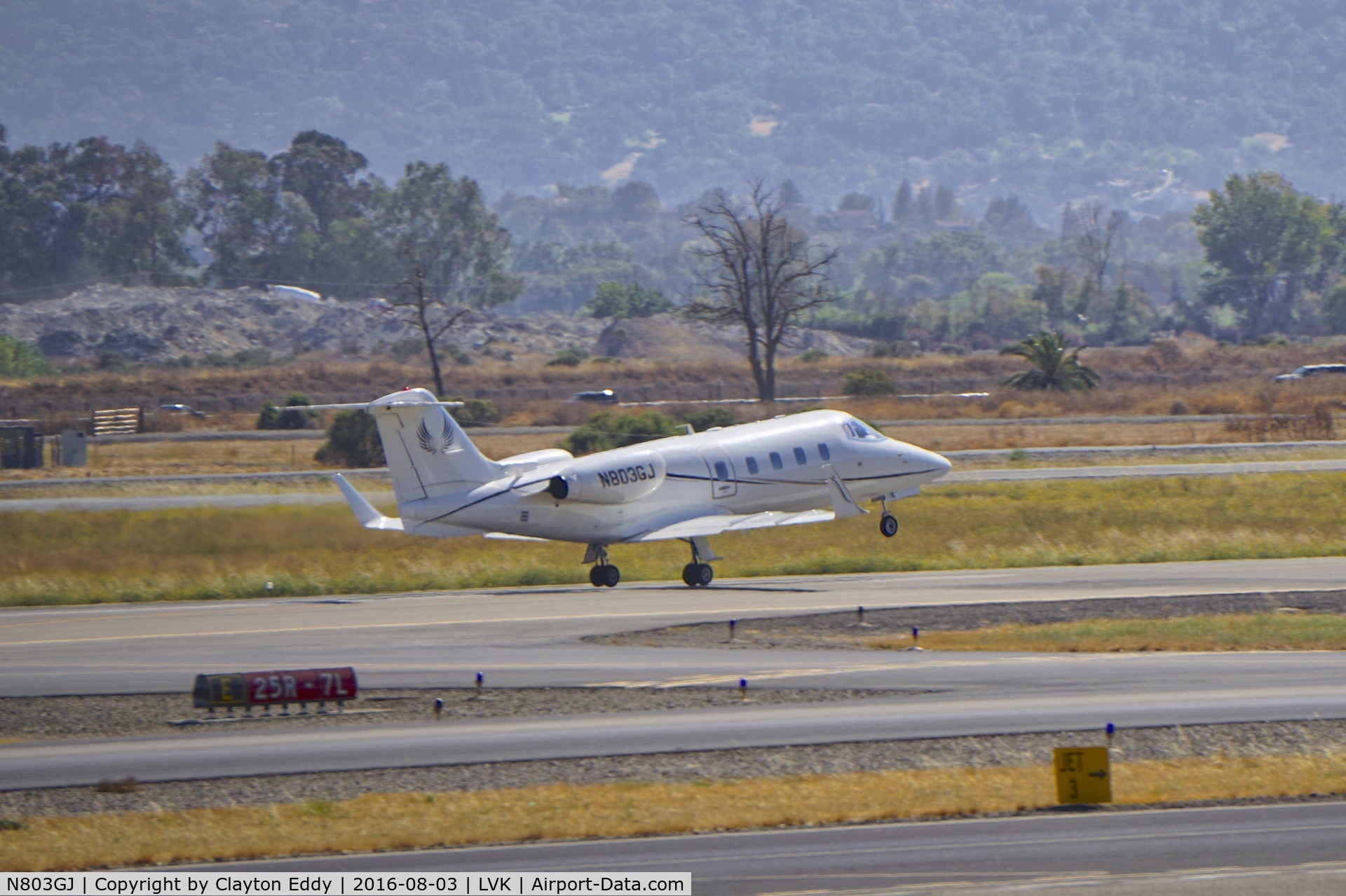 N803GJ, 2013 Gates Learjet 55 C/N 115, Departing Livermore Airport. 2016.