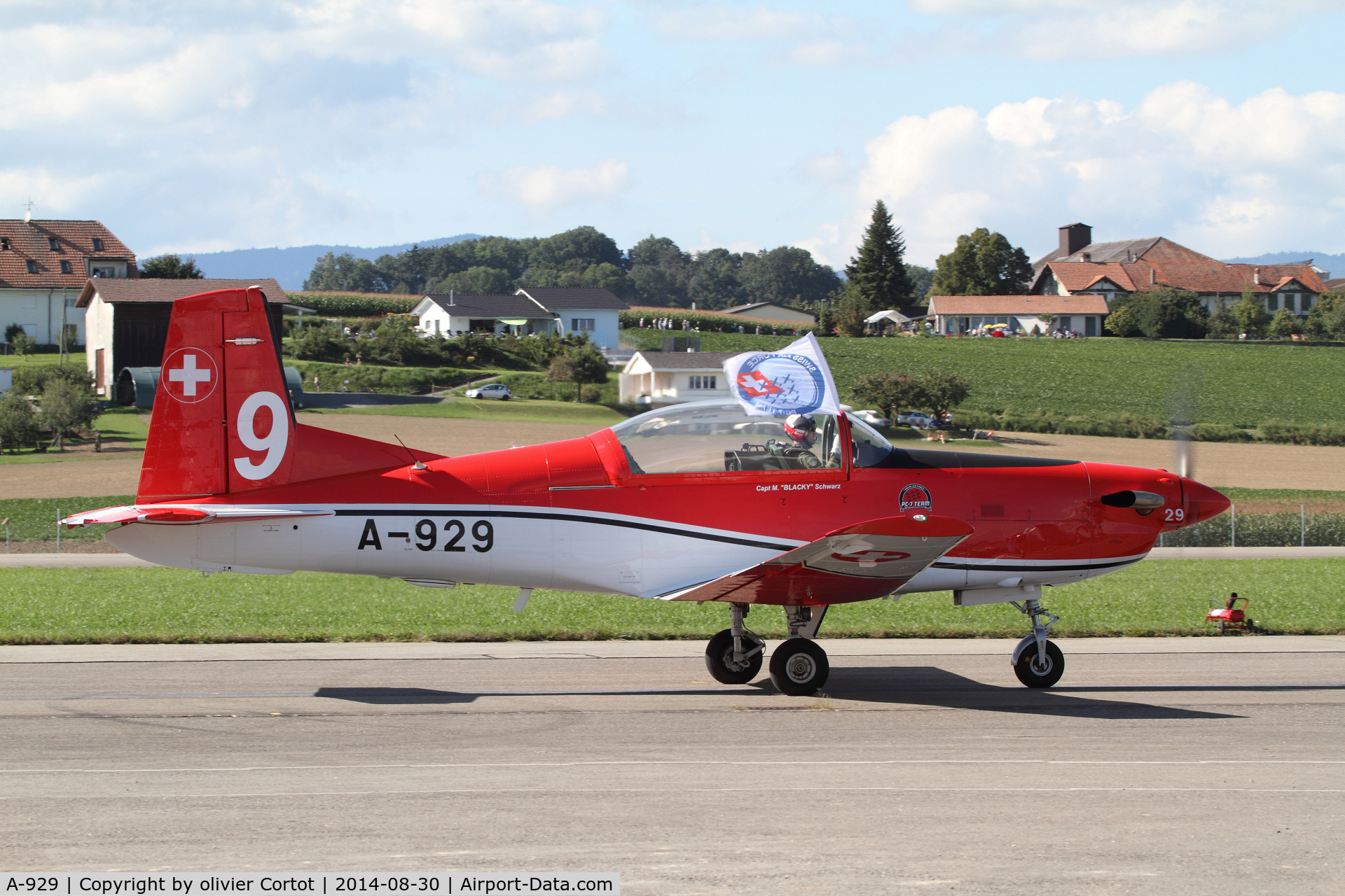 A-929, 1983 Pilatus PC-7 Turbo Trainer C/N 337, with a flag of the team, Air 14