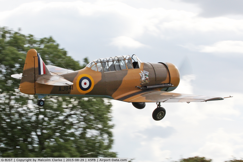 G-BJST, 1953 Canadian Car & Foundry T-6H Harvard Mk.4M C/N 14A-2429, Canadian Car & Foundry T-6H Harvard Mk4M. 'Wackey Wabbit' takes off from Fishburn Airfield, August 29th 2015.