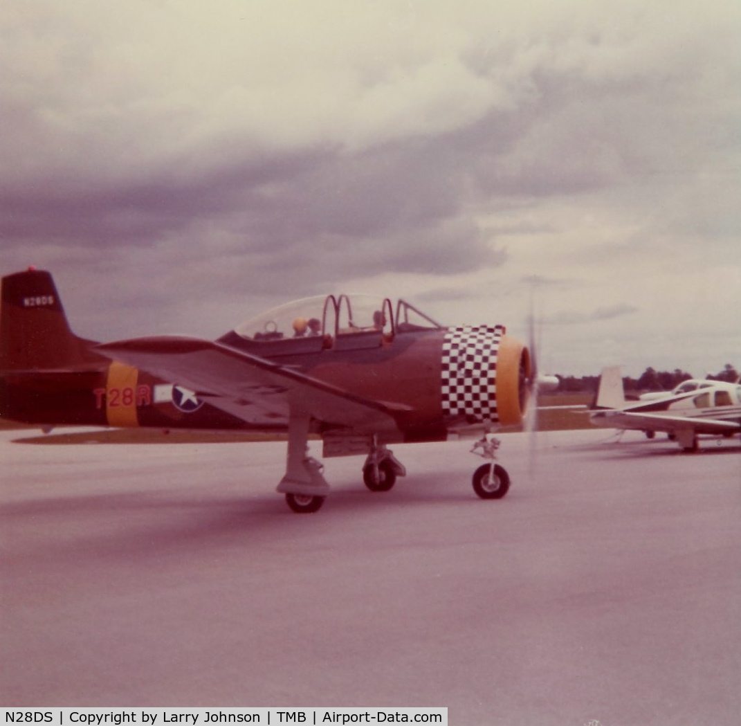 N28DS, 1950 Hamilton T-28R-2 C/N 10, I shot this with an Instamatic camera in the early 1970's.